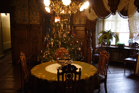 Dining room with Christmas tree in The Victorian Home