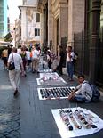 Hawkers with faked goods on the way to the Trevi fountain.