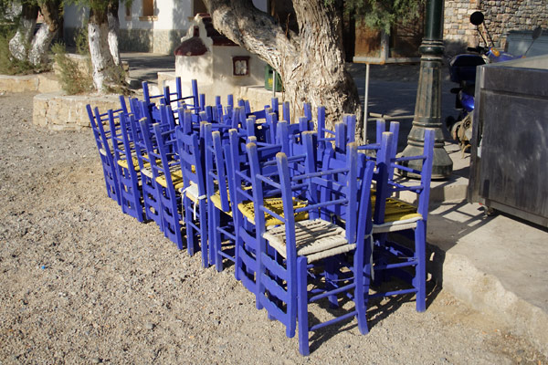 Blue chairs by restaurant Zorbas in Panteli