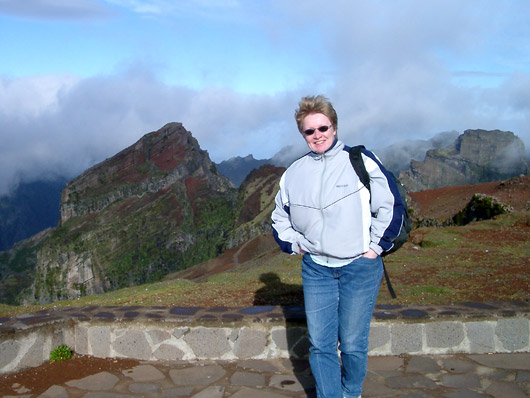 Helle on the windy peak of Pico Do Areeiro.
